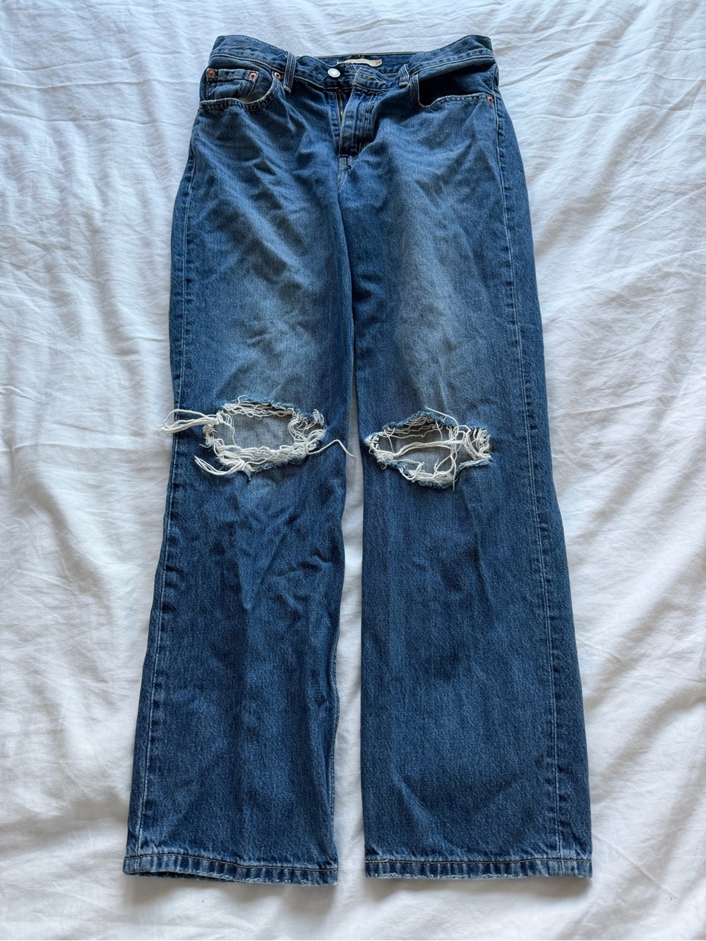 Levi’s Women’s Distressed Knee Straight-Leg Jeans in Dark Blue